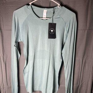 The Tack Hack Equitation Tech long sleeve riding shirt